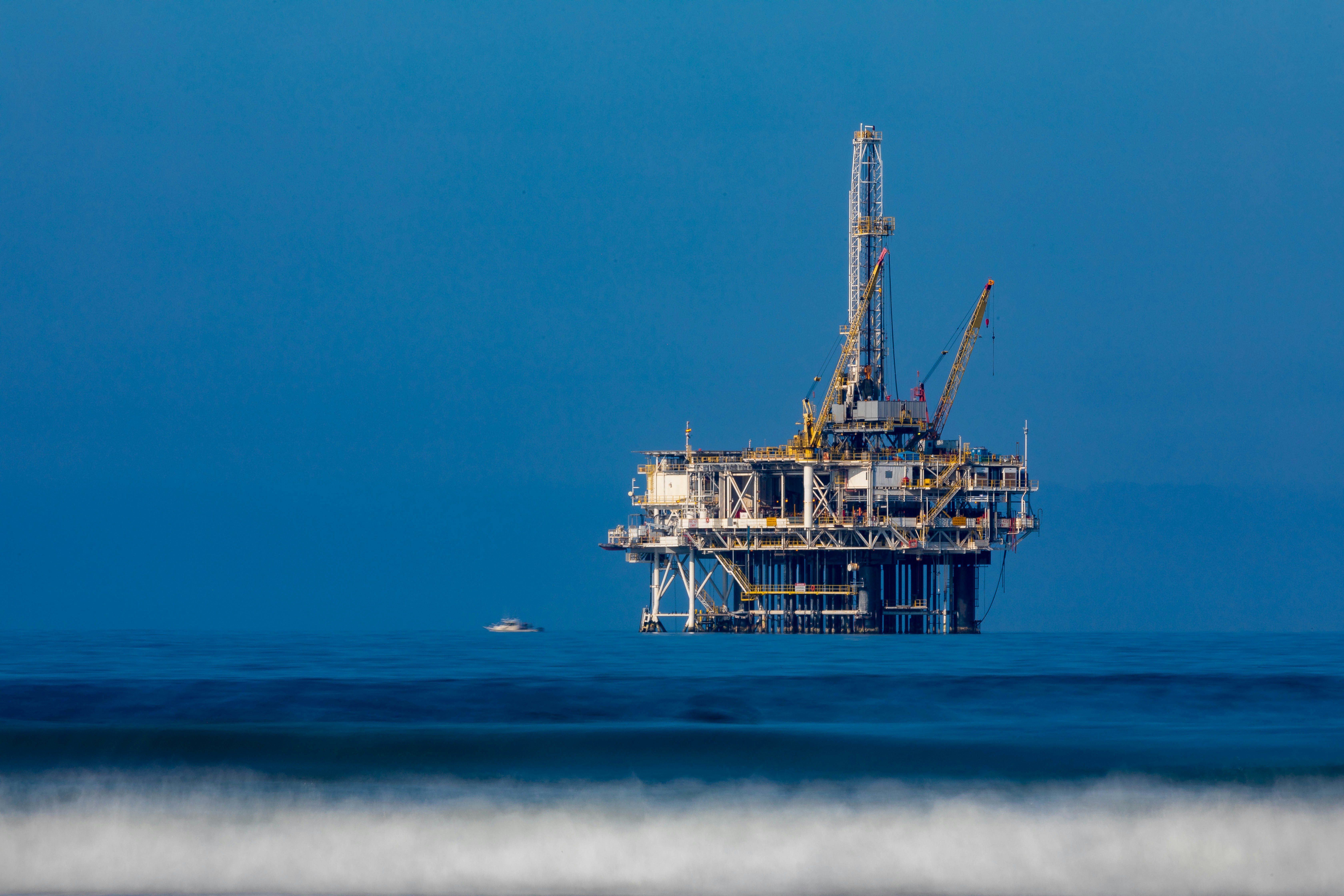 Offshore oil and gas platform in blue water